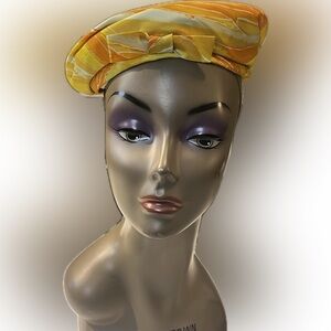 Vintage 60s Yellow & orange swirl pillbox beret with bow